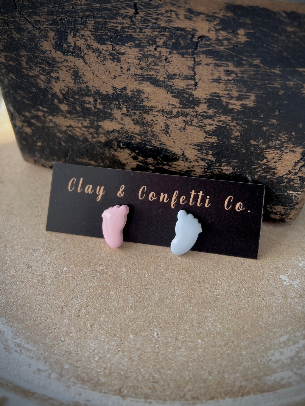 Blue and pink baby feet studs