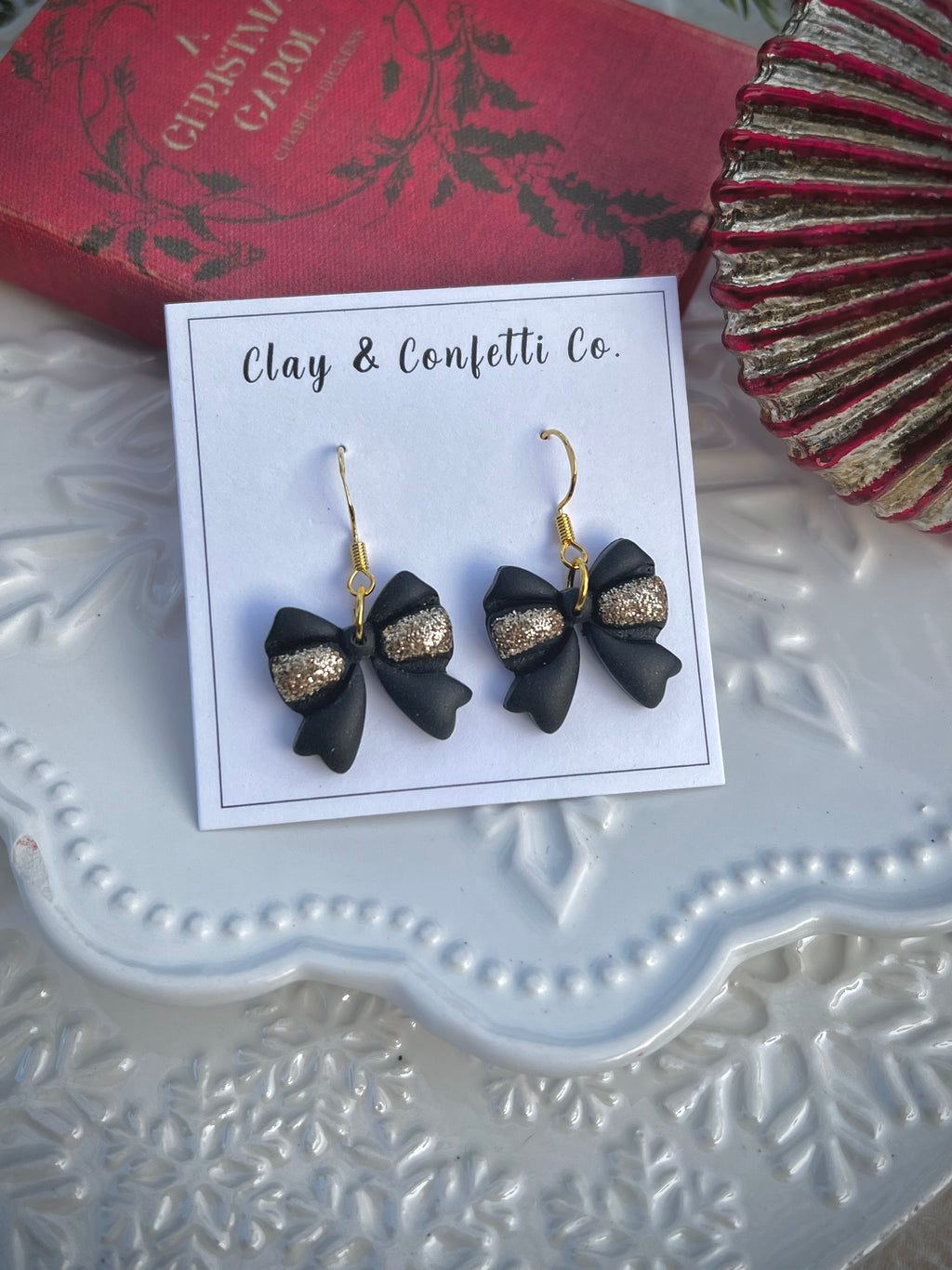 Black with gold bow dangle