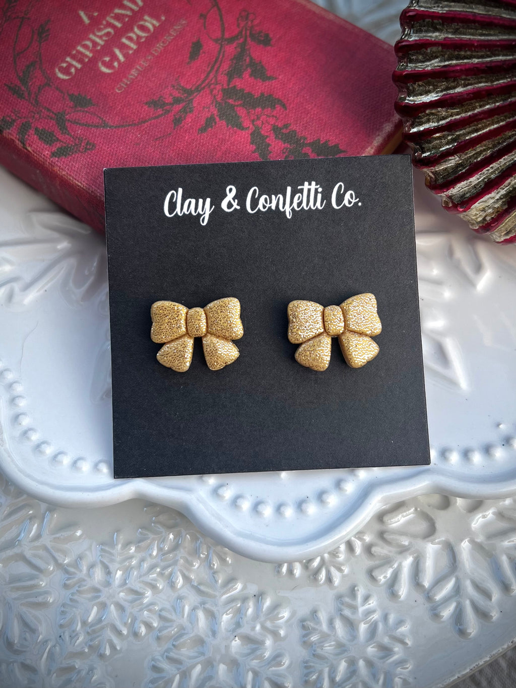 Gold glitter bow stud