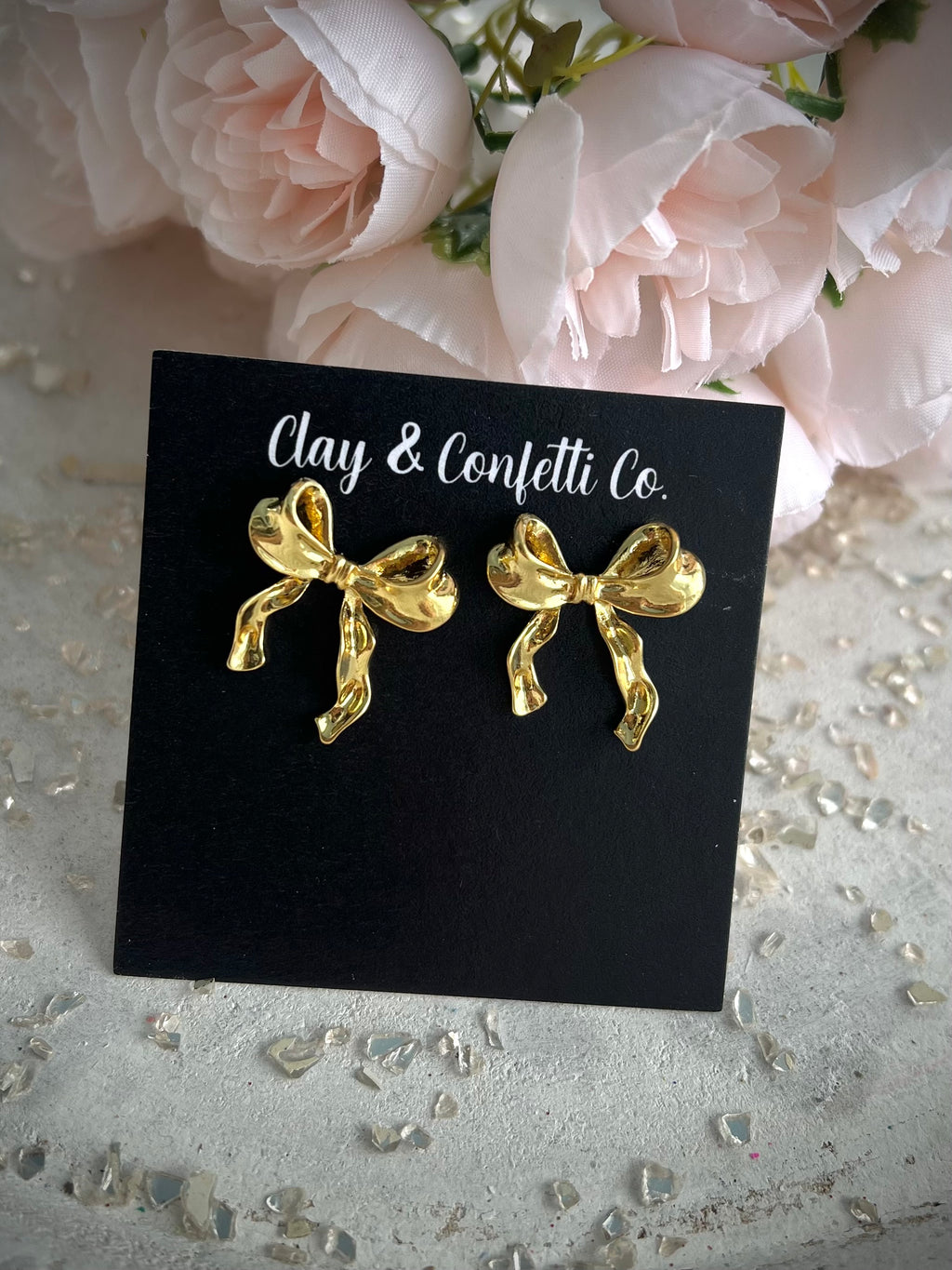 Gold bow stud style 1
