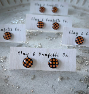 Orange and black checkered stud