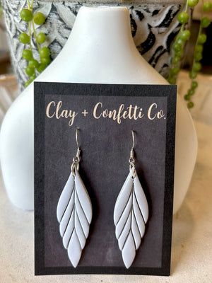 Grey feather , coral feather , light pale green feather