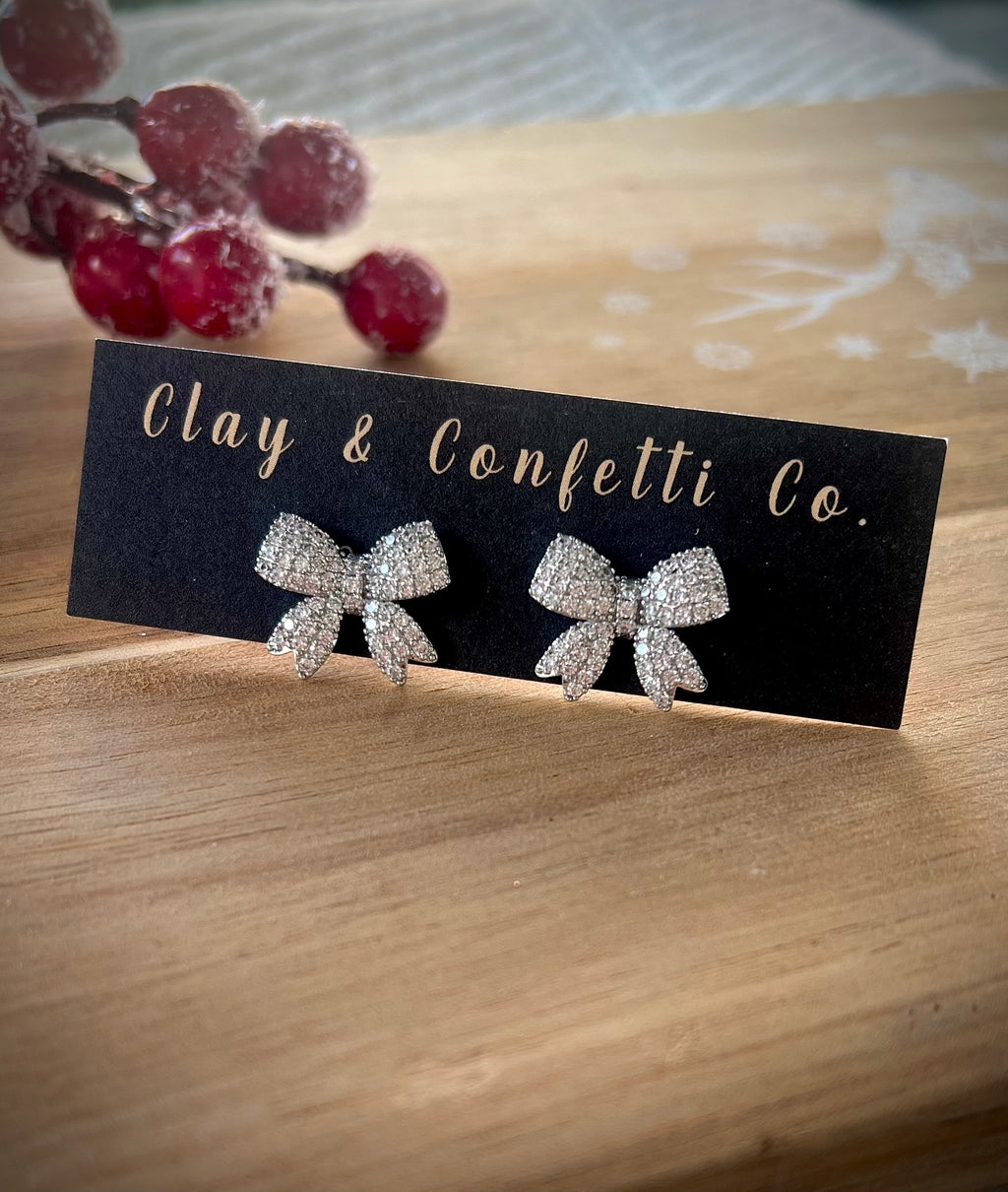 Glitzy silver bow stud