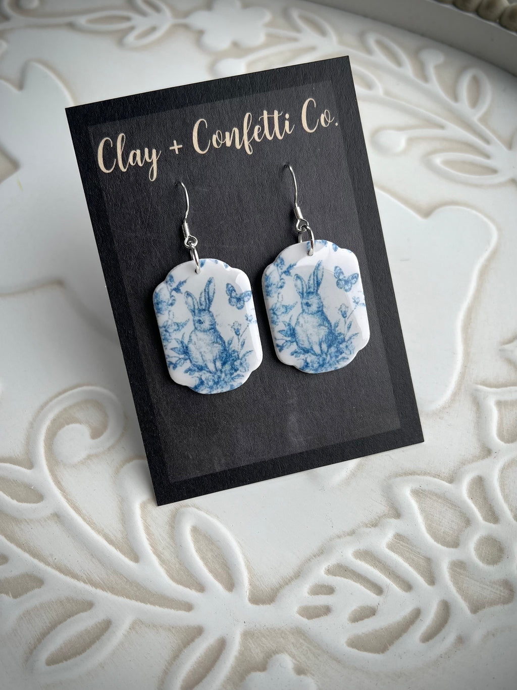 Blue bunny with butterfly dangle