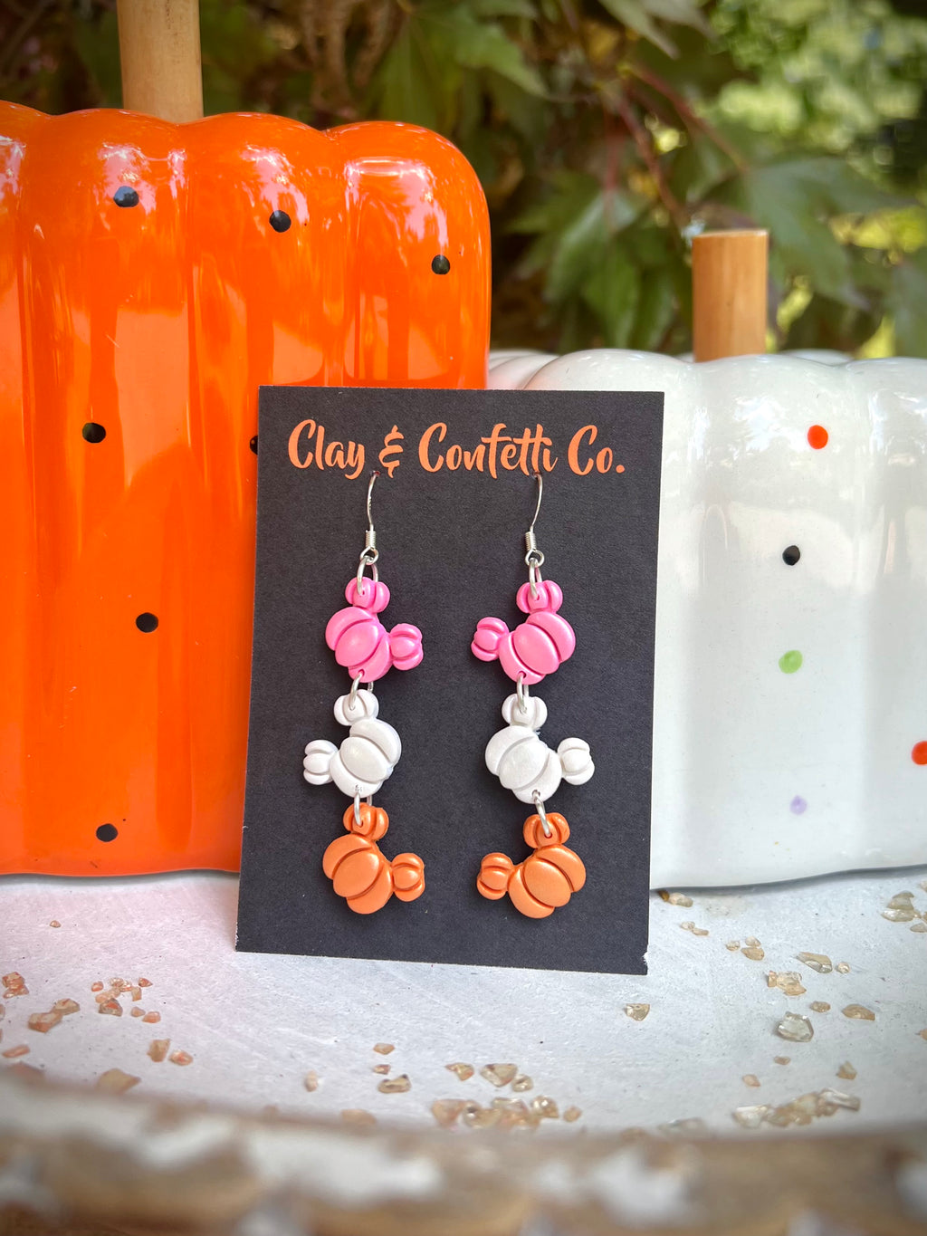 A pink shimmer Halloween mickey dangle