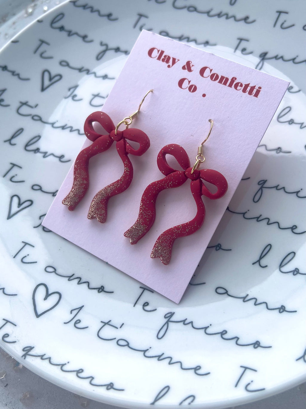 Red with gold glitter bow