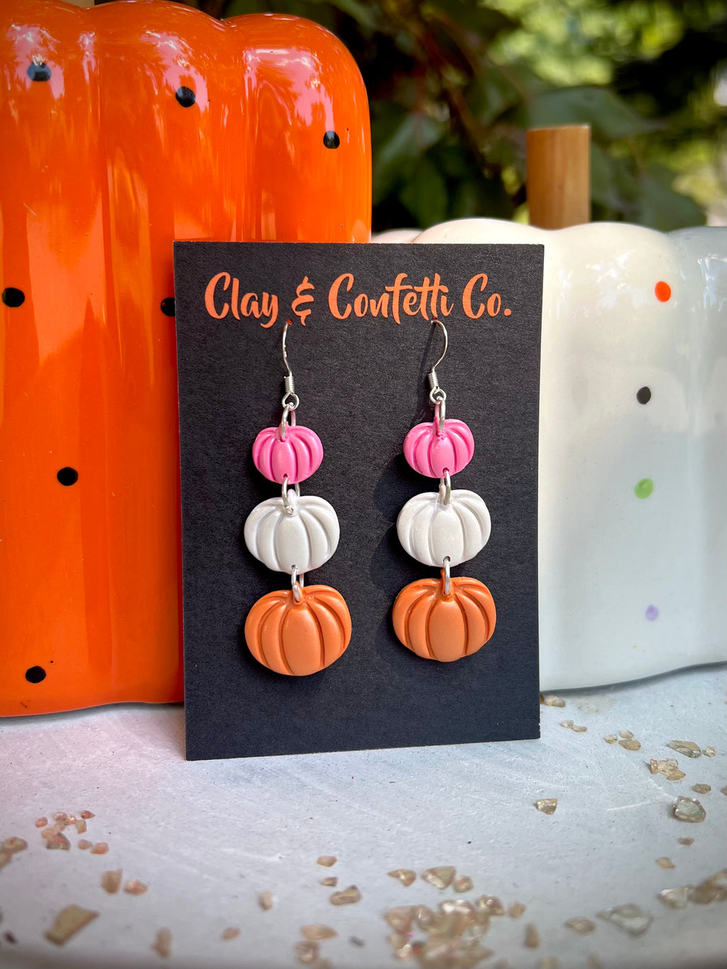 A pink shimmer Halloween pumpkin dangle