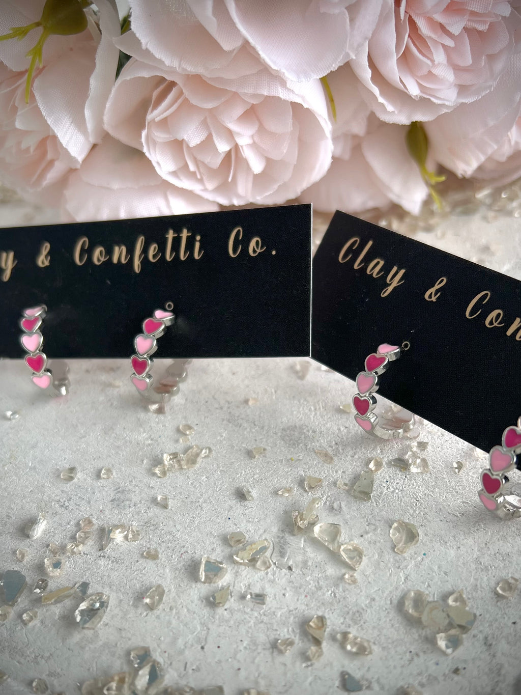 Multi pink silver huggie