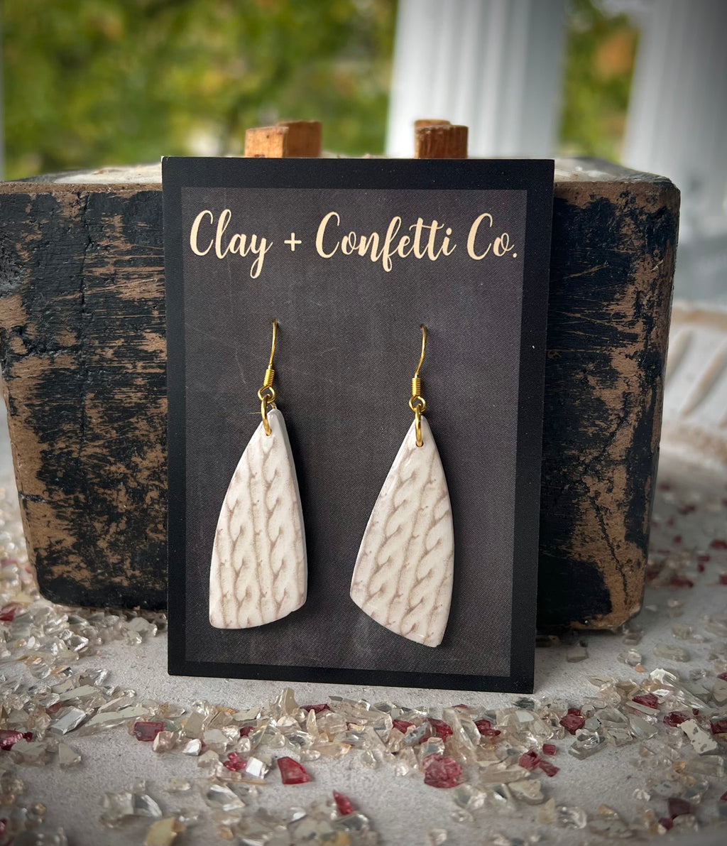 Cream knitted sweater Elongated Triangle Dangle