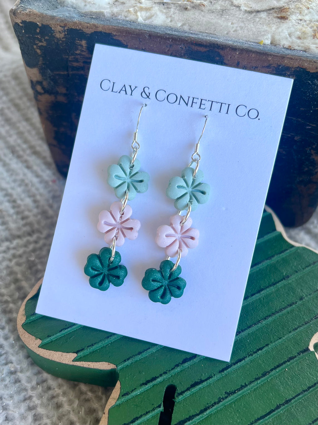 Muted triple shamrock dangle