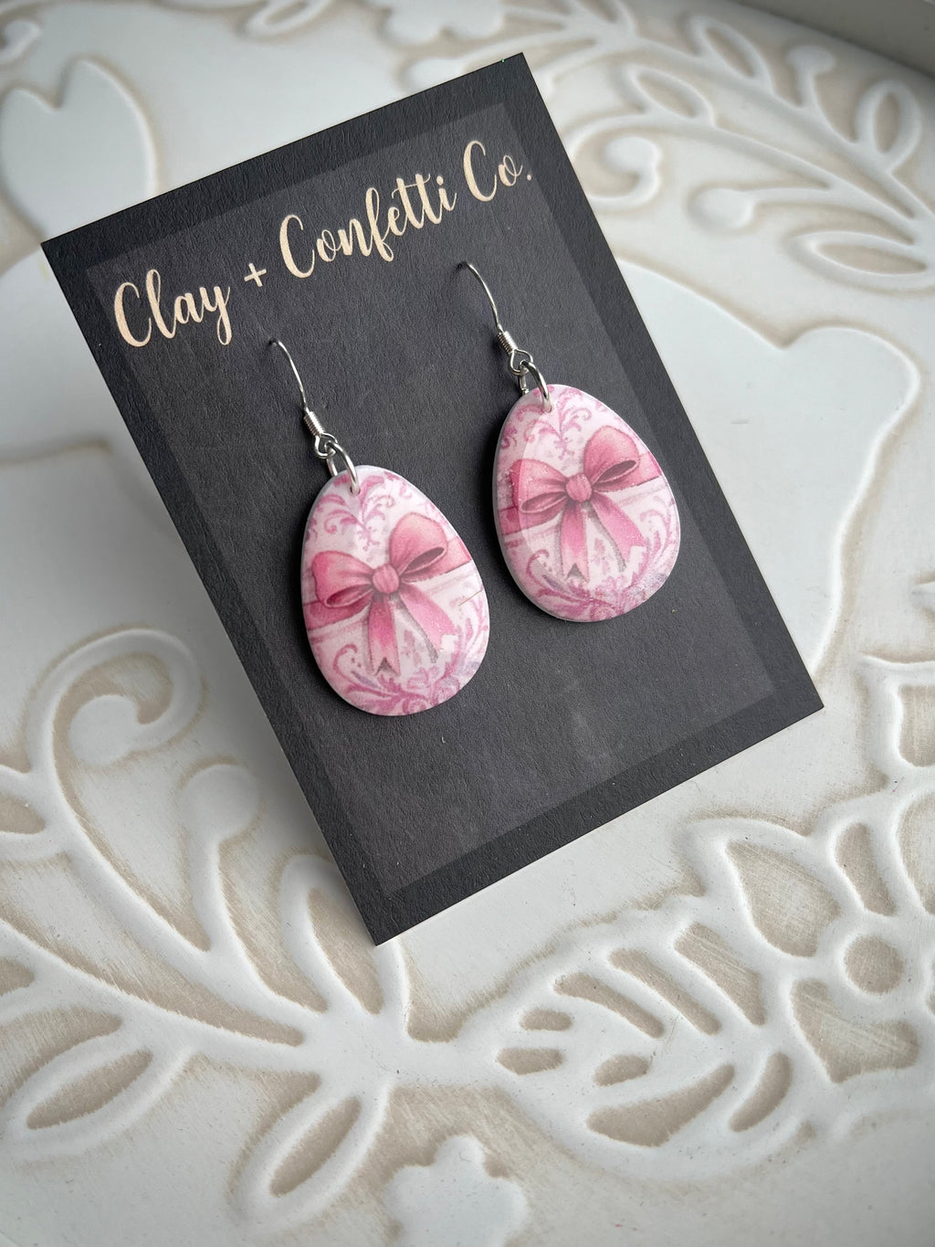 Pink filigree with bow egg dangle