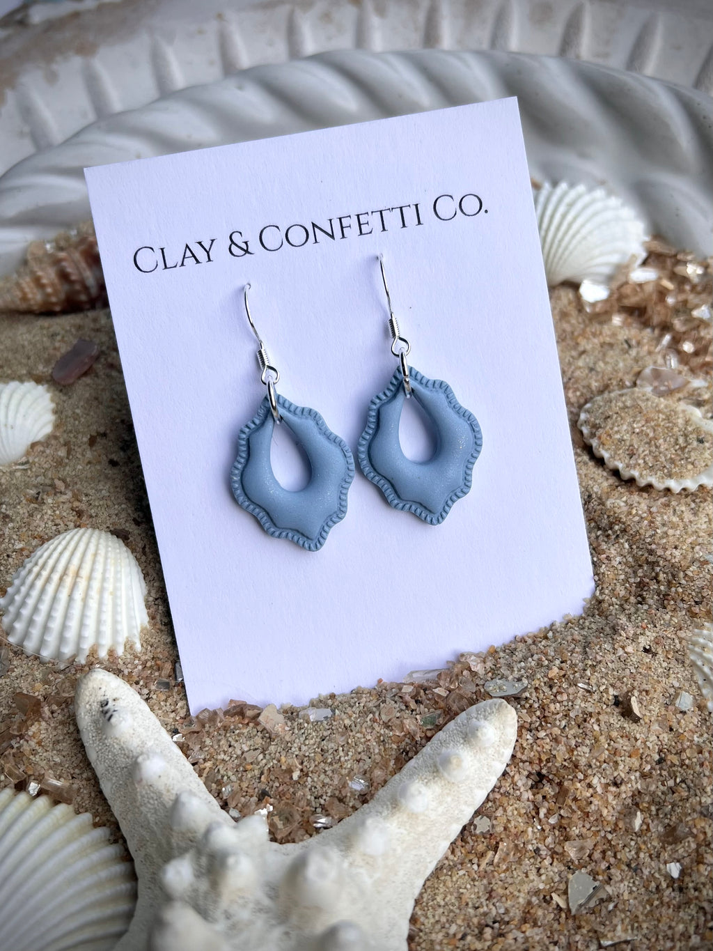 medium blue ribbed dainty tear dangle