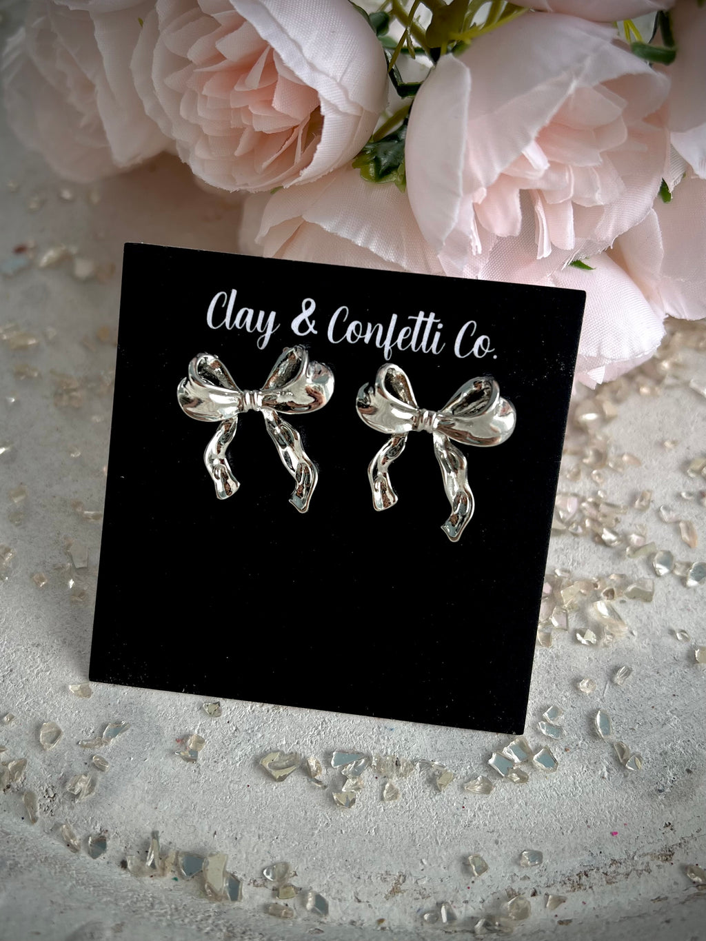 Silver bow stud style 1