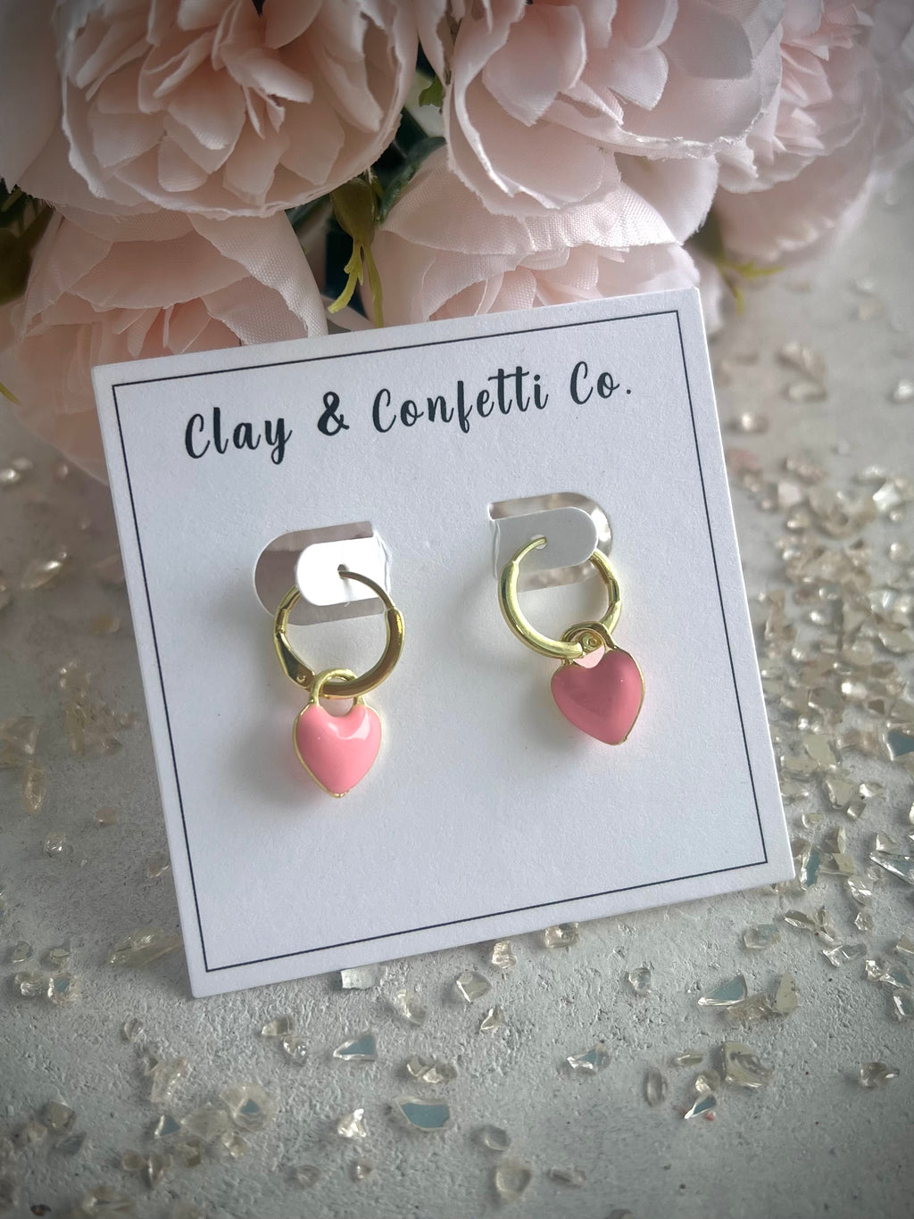 Pink heart charm on huggie hoop
