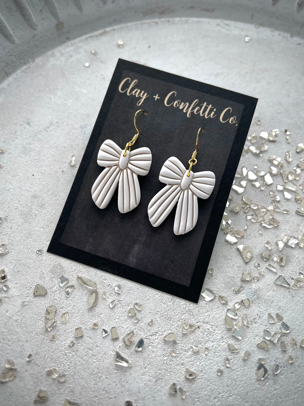 Amelia Bow Cream Dangle