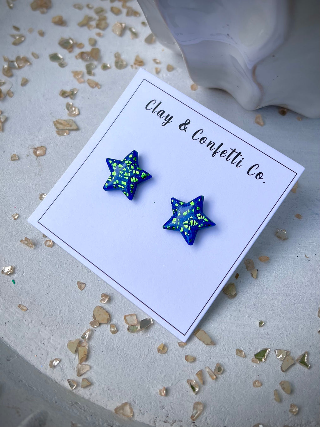 Cns metallic star stud