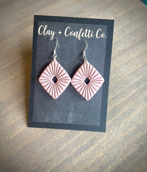 Muted dusty rose detailed diamond