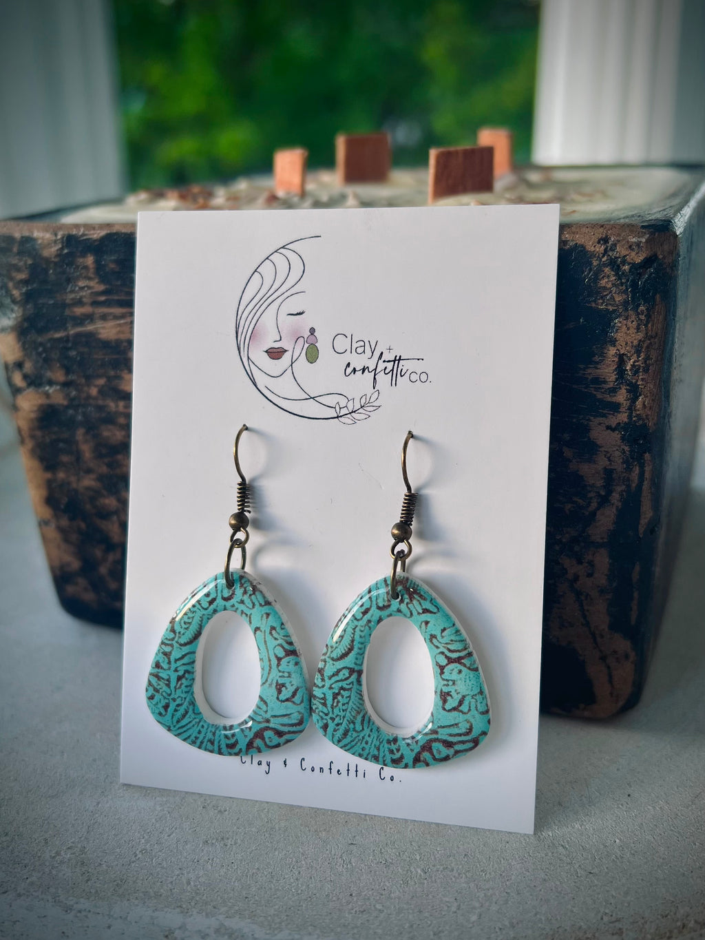 Tooled aqua leather oval center triangle dangle