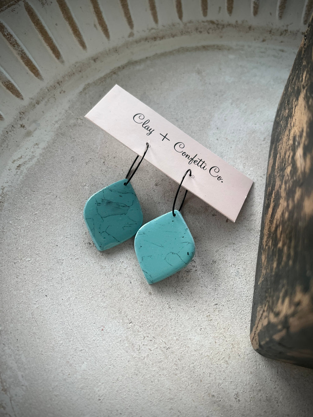 Turquoise marble tear on a hoop