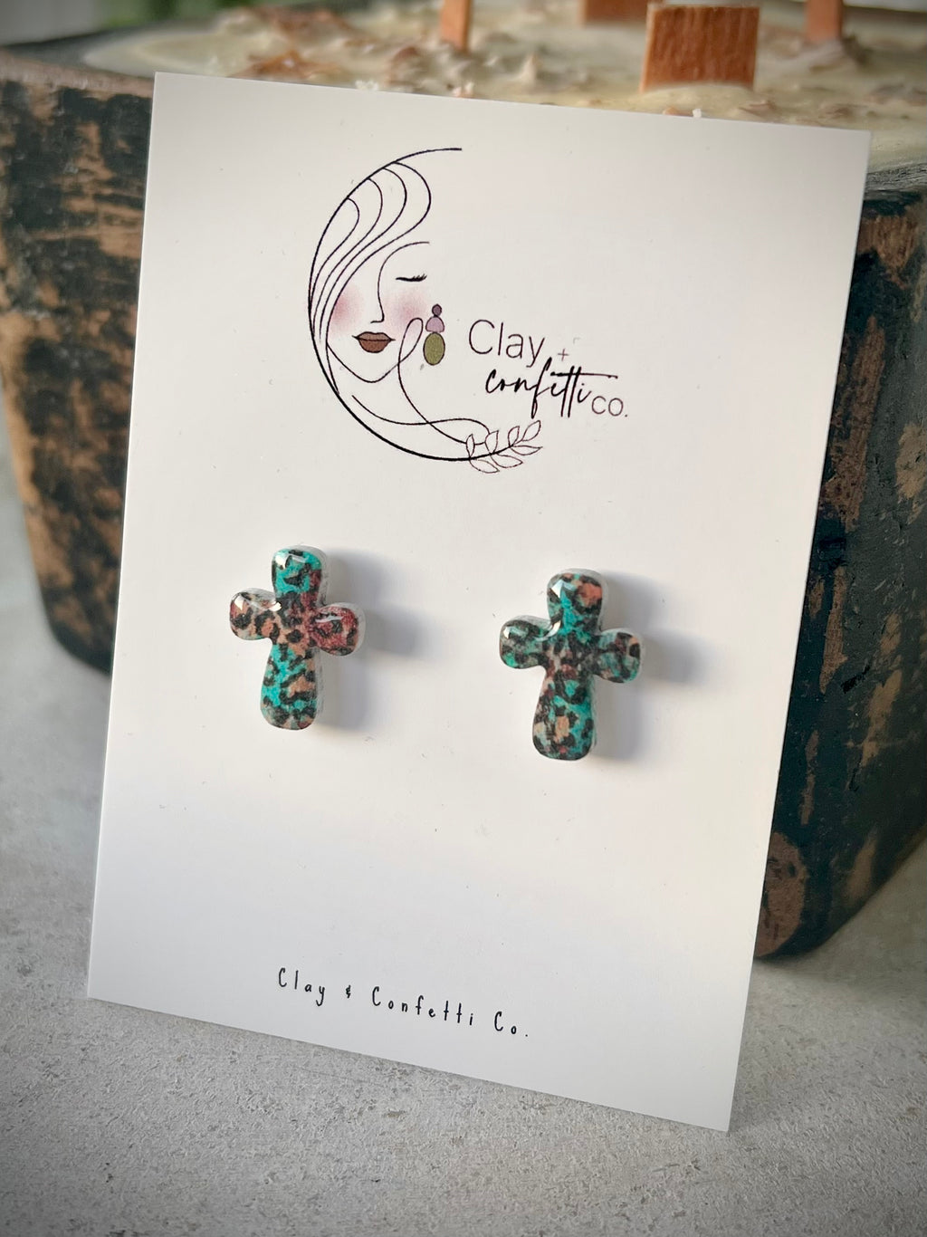 Aqua cheetah cross stud