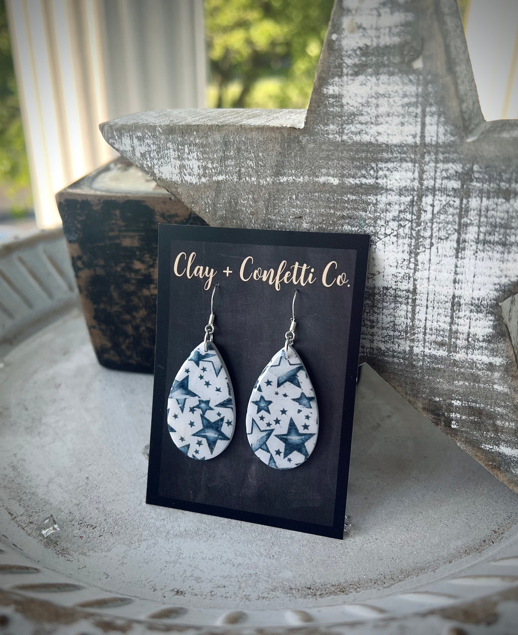 Faded blue star tear dangle