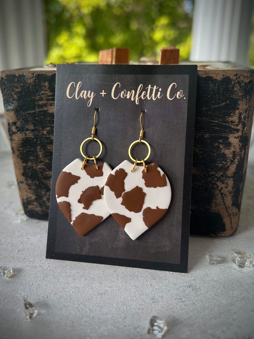 Brown cow tear slab featherly dangle