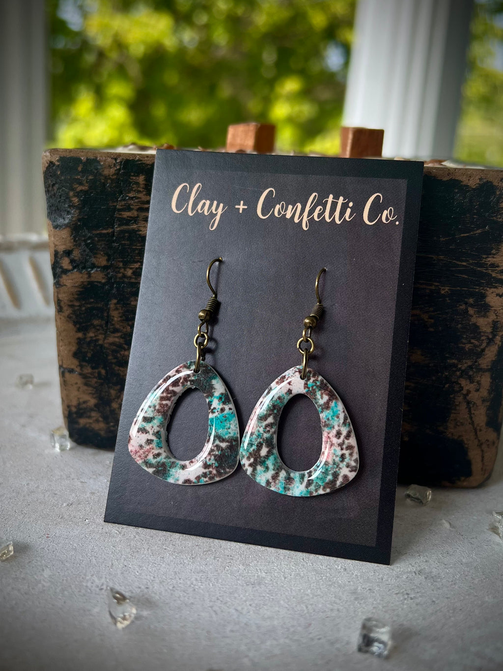 Aqua cowhide oval triangle dangle