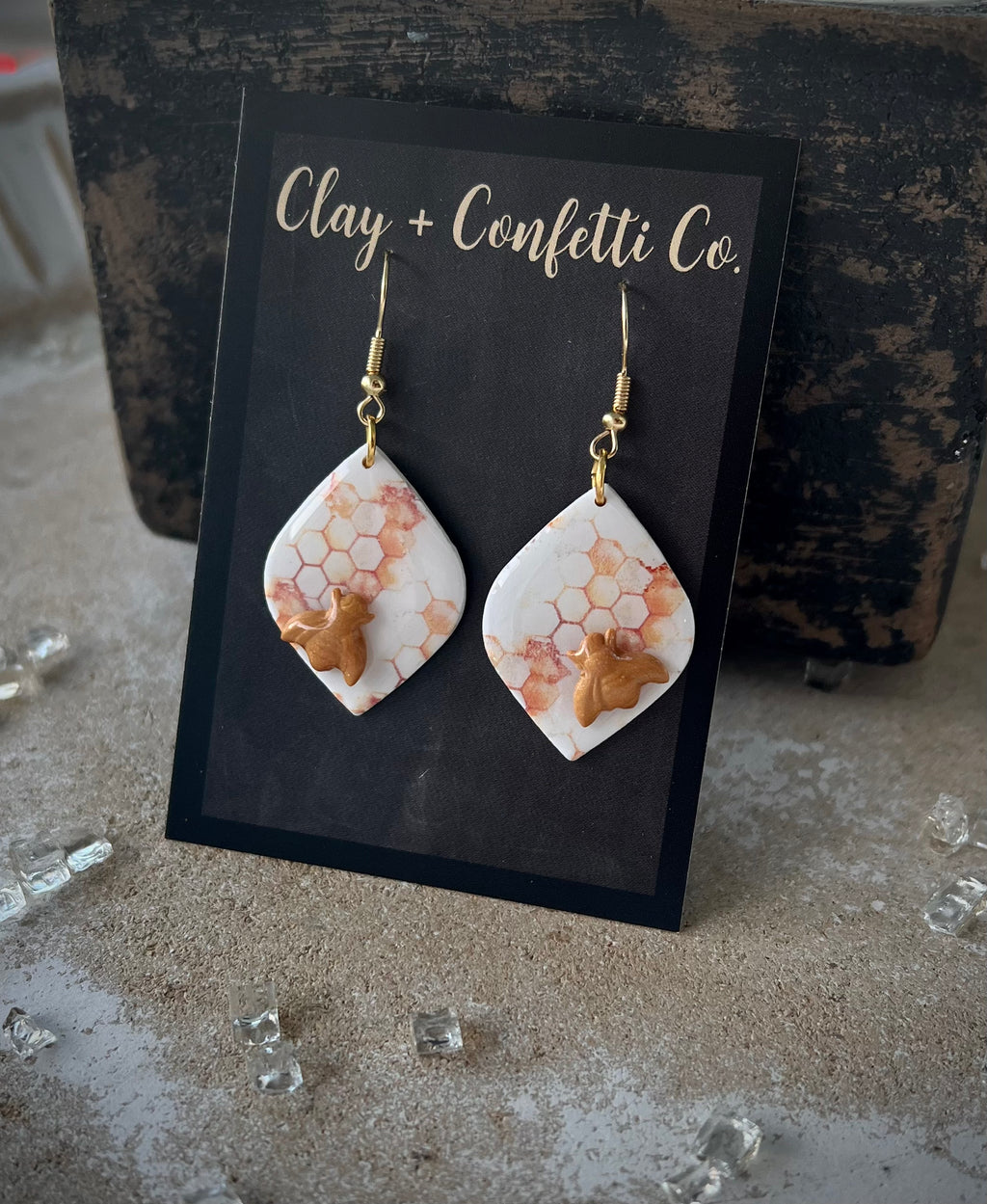 Honeycomb tear on a fishhook with bee