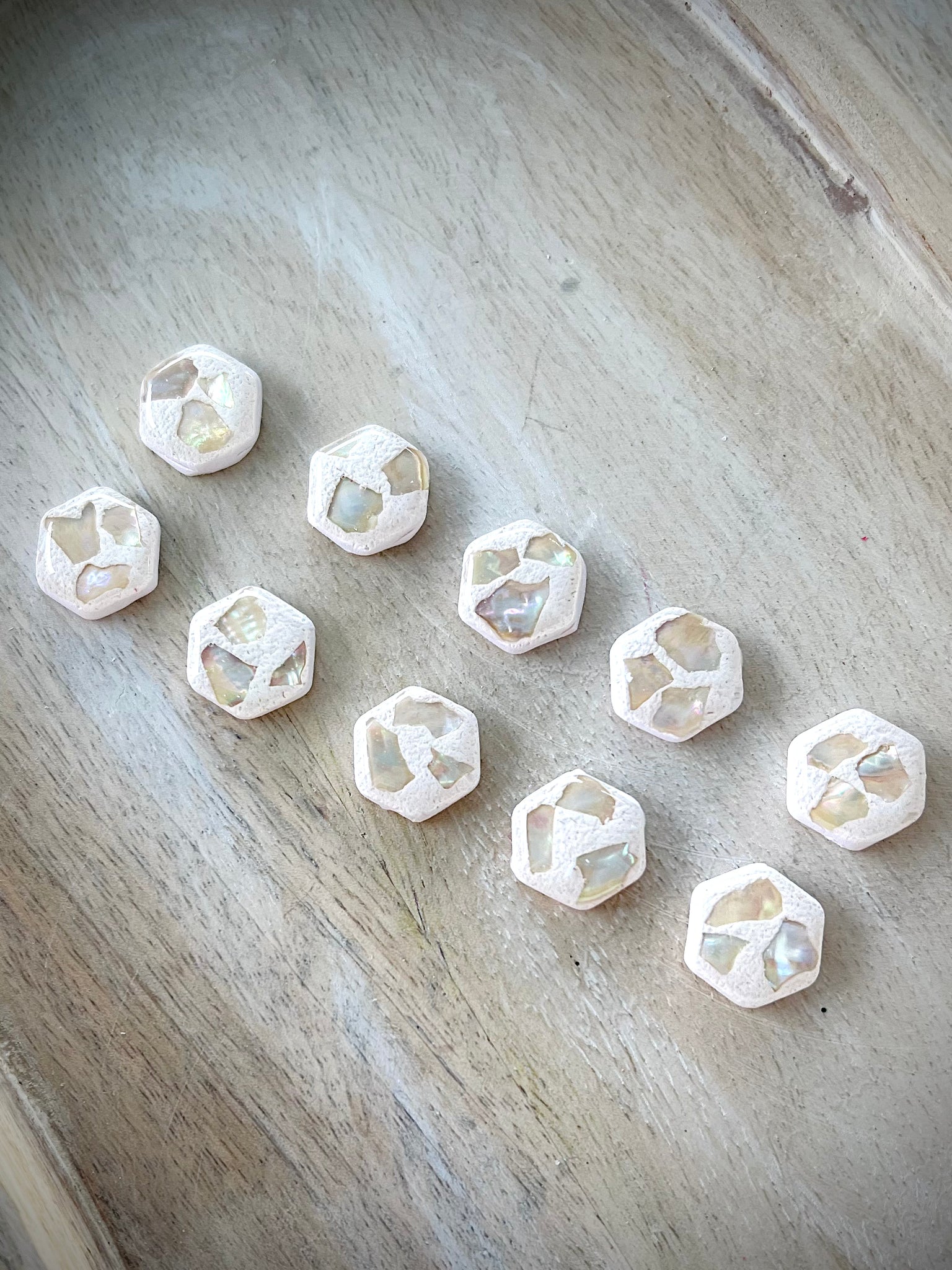 White stone shell stud with resin