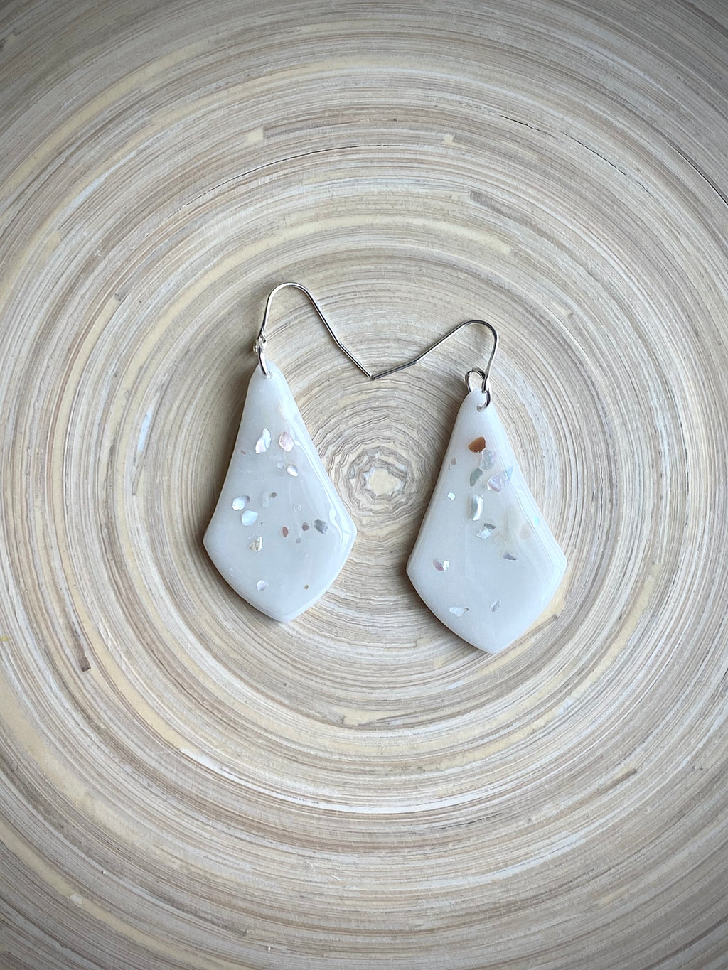 Milk glass kite dangle with shells