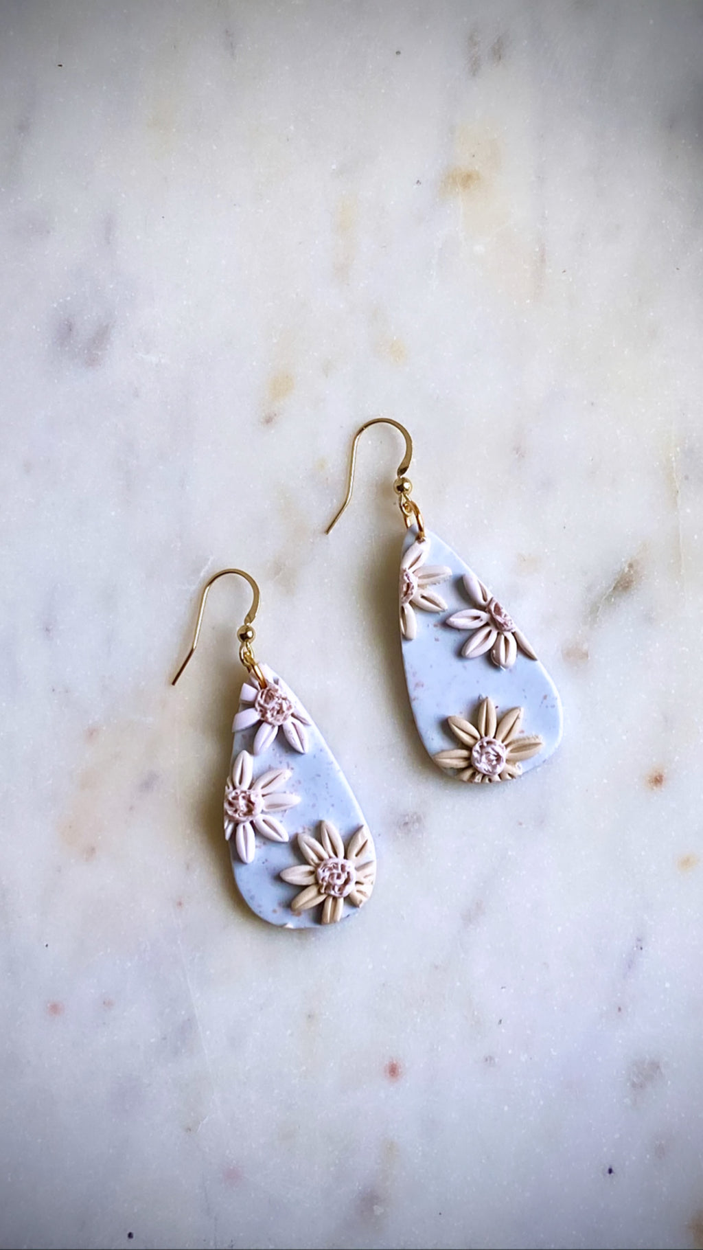 Muted blue and cream with gold daisy tear