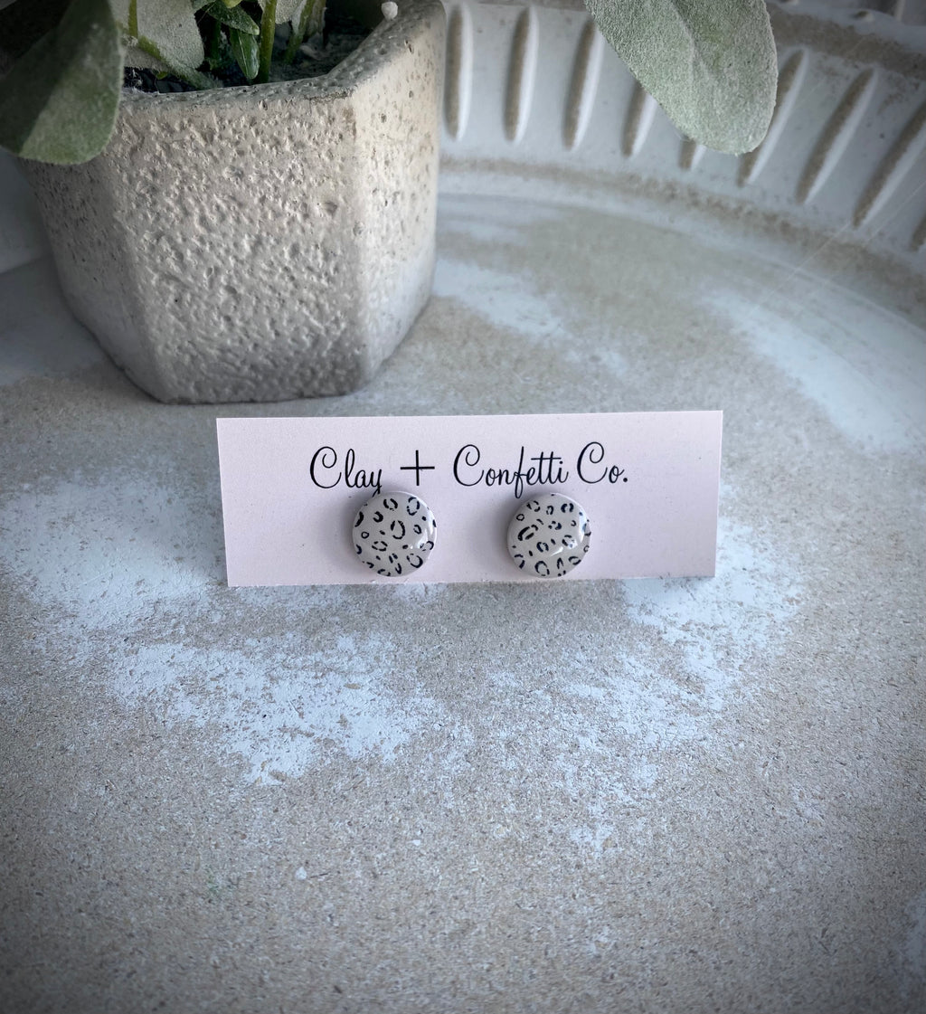 Dainty leopard cream studs