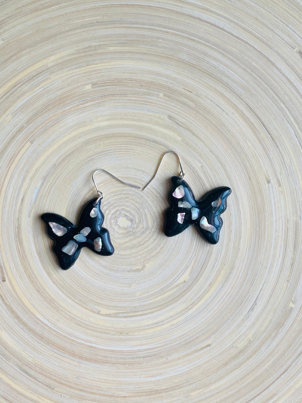 Black butterfly dangle with shells
